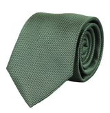 Conjunto de presente com gravata, lenço de bolso e abotoaduras em cetim de seda texturizado verde fosco.