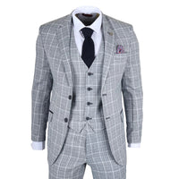 Terno xadrez cinza com camisa branca, gravata preta e lenço de bolso sobre fundo branco.