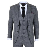 Terno xadrez cinza com camisa branca, gravata preta e lenço de bolso sobre fundo branco.