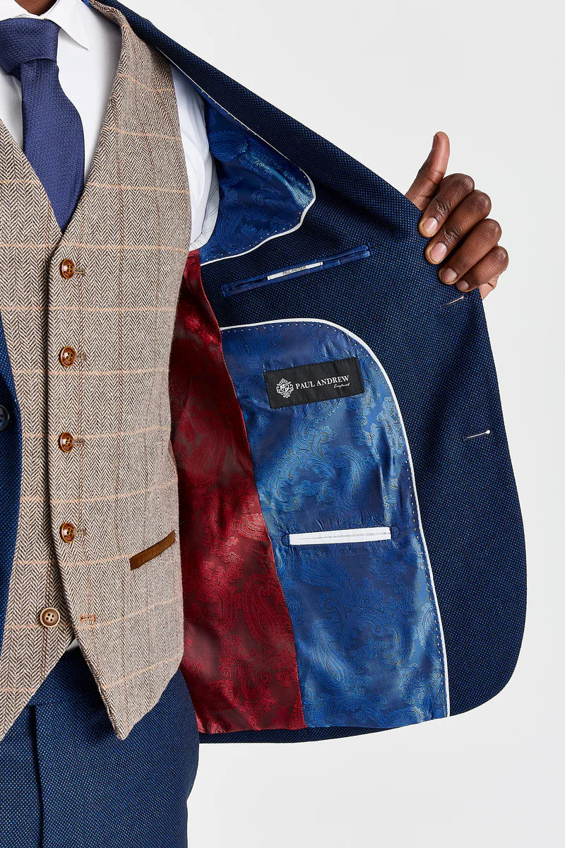 Terno Arthur Navy com colete contrastante Harris Brown em tweed.