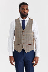 Terno Arthur Navy com colete contrastante Harris Brown em tweed.