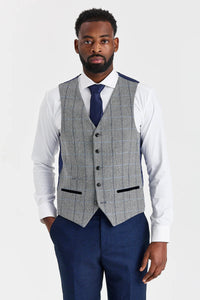 Terno Arthur Navy com colete contrastante Harris em tweed cinza.