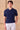 Camisa polo masculina azul-marinho escuro com textura canelada