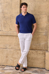 Camisa polo masculina azul marinho com textura canelada