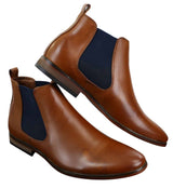 Sapatos masculinos pretos com cadarço, estilo casual elegante, em camurça com detalhes em couro envernizado brilhante.