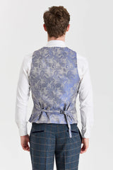 Terno Harris em tweed azul-marinho com colete Belmont prateado contrastante.