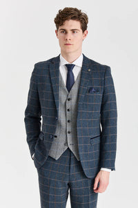 Terno Harris em tweed azul-marinho com colete Harris em tweed cinza contrastante.