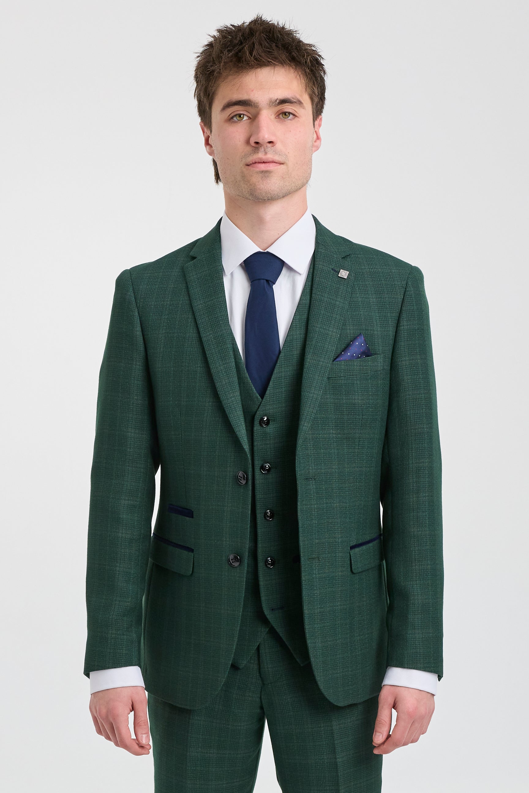 Leo - Terno masculino verde de três peças com estampa xadrez e corte sob medida.