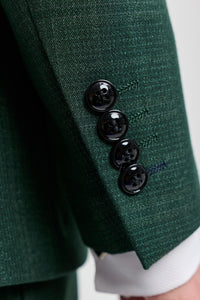 Leo - Terno masculino verde de três peças com estampa xadrez e corte sob medida.