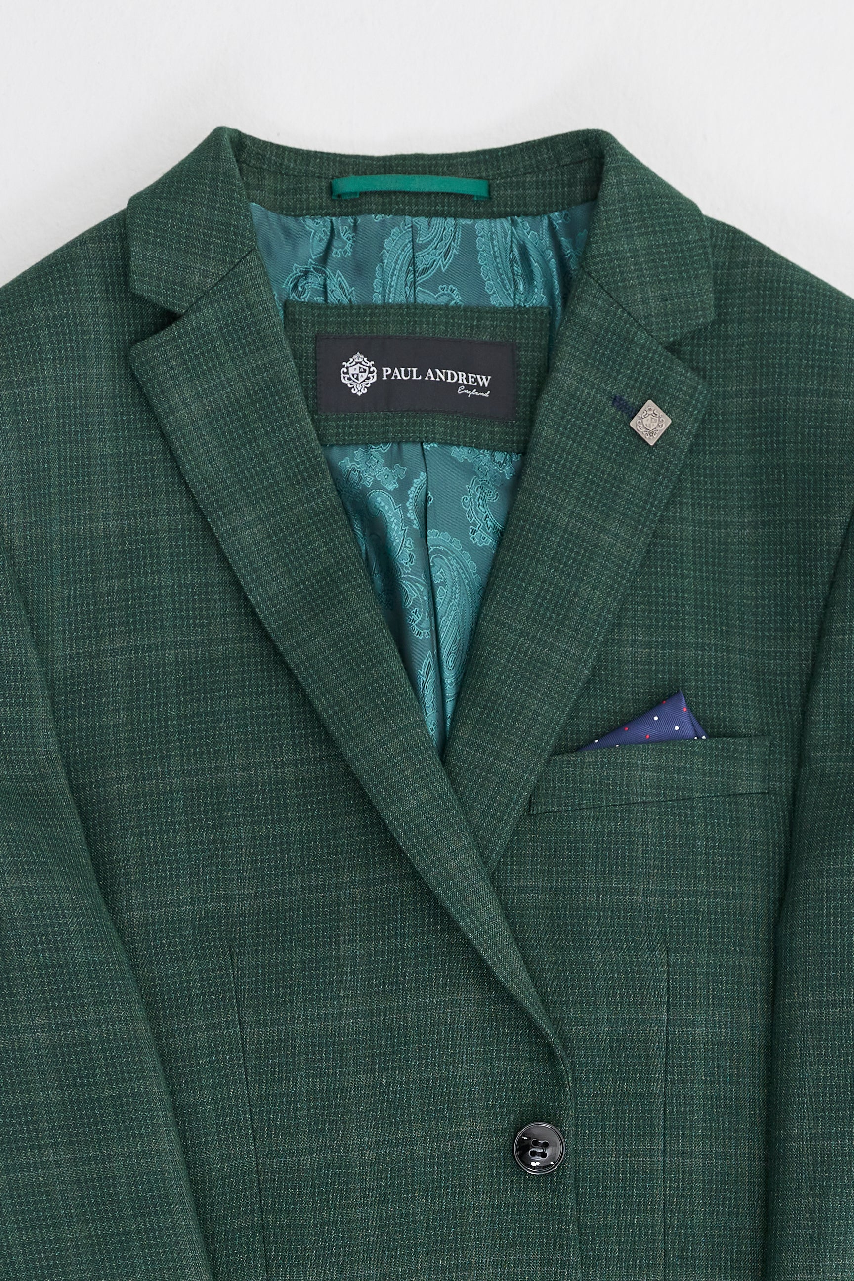 Leo - Terno masculino verde de três peças com estampa xadrez e corte sob medida.