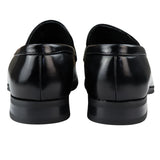 Mocassim masculino preto, modelo loafer, forrado em couro, sem fecho, elegante e formal.
