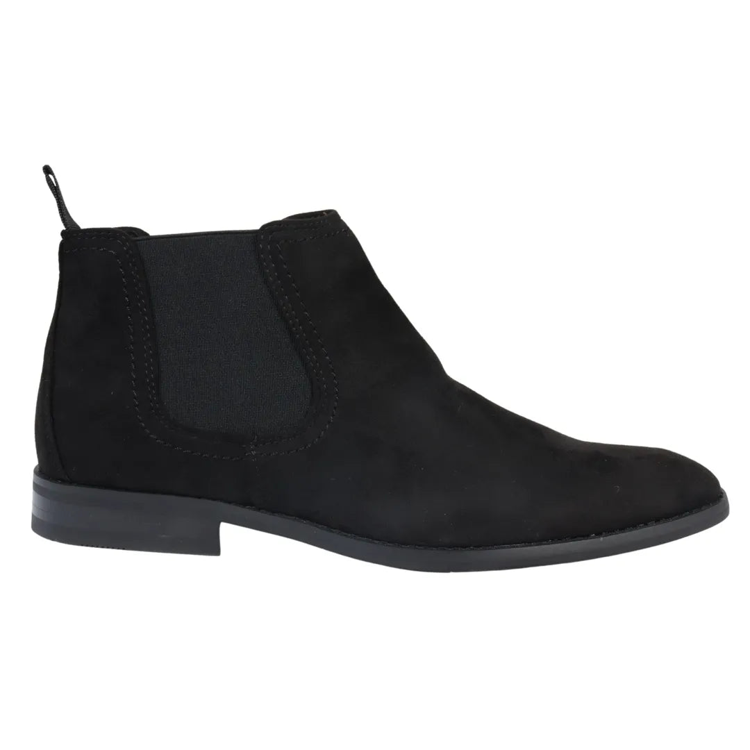 Botas Chelsea masculinas de cano alto, forradas em camurça preta.