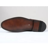 Botas Chelsea masculinas de cano alto, forradas em camurça preta.