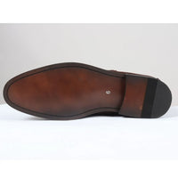 Botas Chelsea masculinas de cano curto, forradas em camurça cinza.