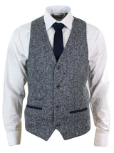 Blazer colete masculino cinza e azul com estampa espinha de peixe em tweed, corte slim, estrutura robusta, estilo casual elegante.