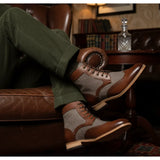 Botas de cano curto estilo brogue com bico de asa para homem