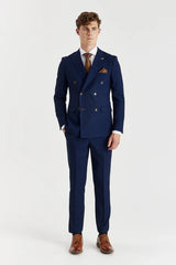 Blazer masculino azul-marinho com estampa olho de perdiz e abotoamento duplo.