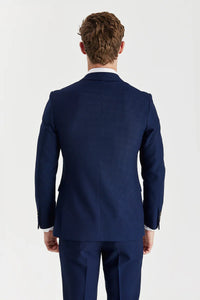 Blazer masculino azul-marinho com estampa olho de perdiz e abotoamento duplo.