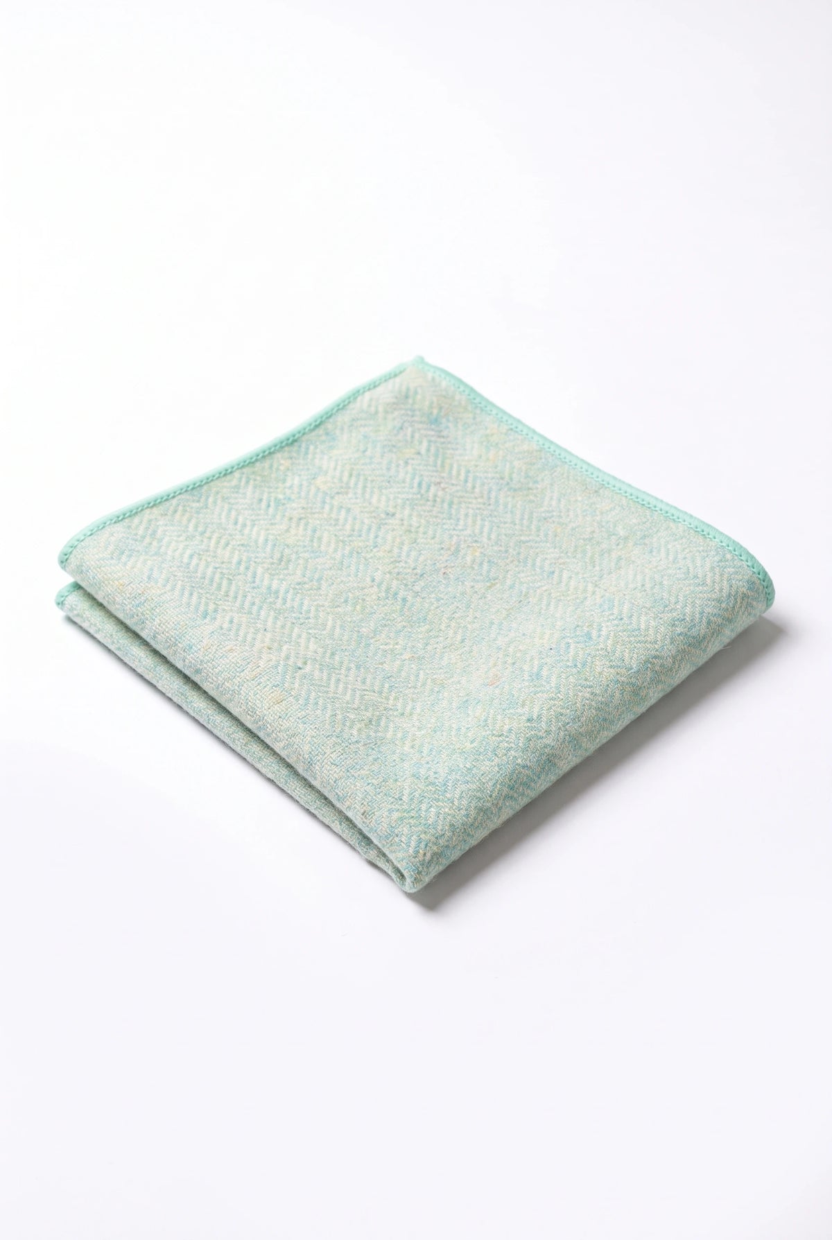Lenço de bolso masculino em tweed verde sálvia com mistura de lã.