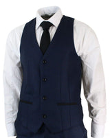 Terno masculino de três peças, azul e preto, corte sob medida, elegante e formal, ideal para casamentos e festas.
