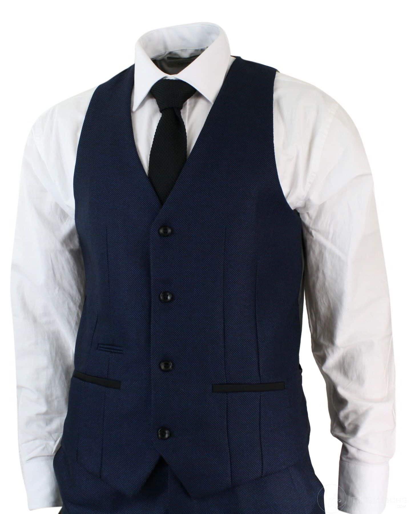 Terno masculino de três peças, azul e preto, corte sob medida, elegante e formal, ideal para casamentos e festas.