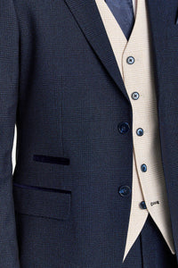 Terno xadrez azul-marinho Regent com colete creme Regent contrastante.