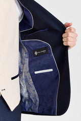 Terno xadrez azul-marinho Regent com colete creme Regent contrastante.