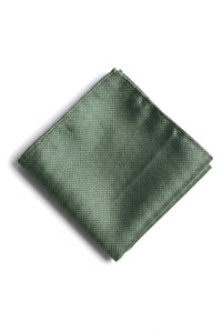Conjunto de presente com gravata, lenço de bolso e abotoaduras em cetim de seda texturizado verde fosco.