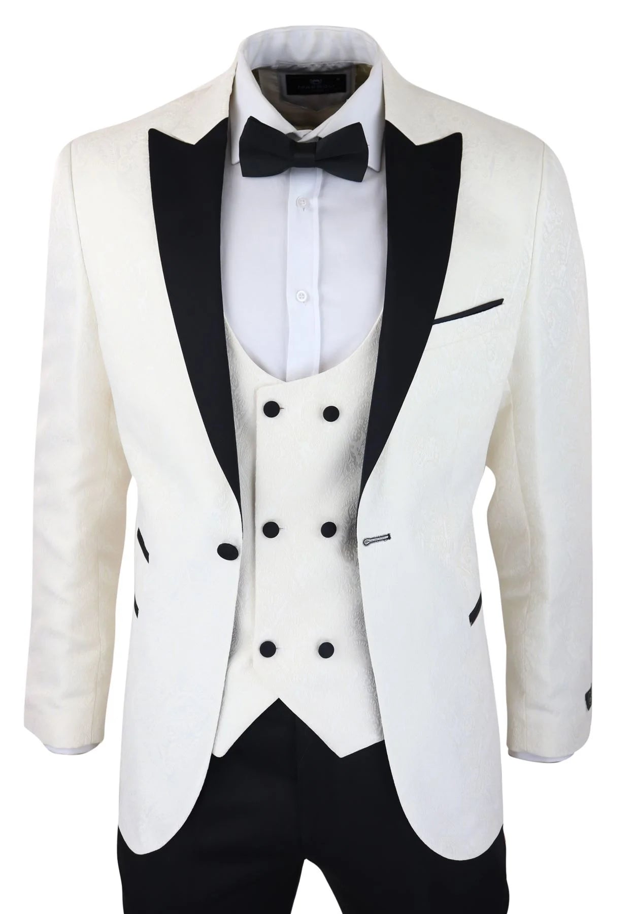 Smoking masculino com blazer e colete em brocado com estampa paisley, nas cores marfim e preto.