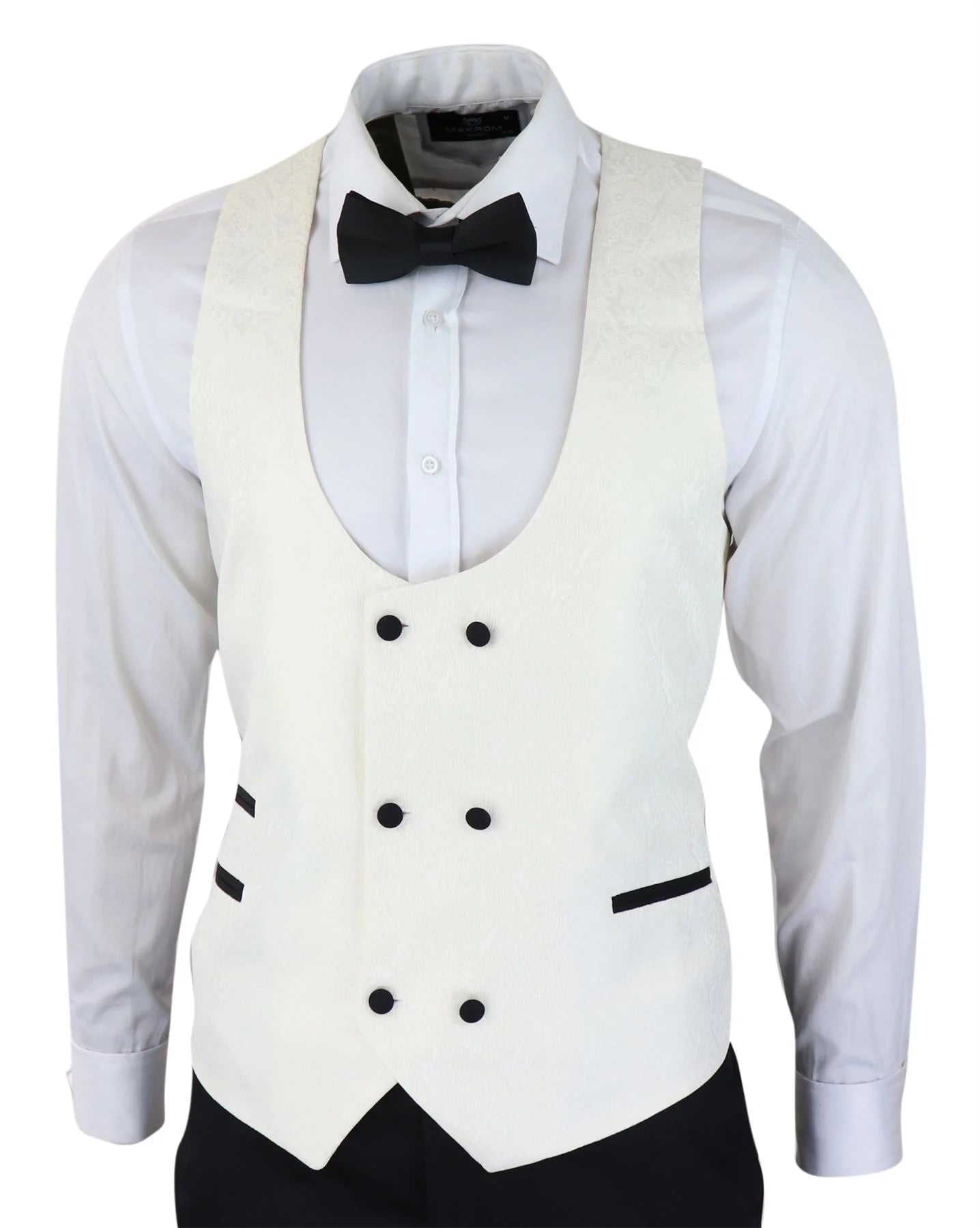 Smoking masculino com blazer e colete em brocado com estampa paisley, nas cores marfim e preto.