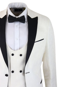 Smoking masculino com blazer e colete em brocado com estampa paisley, nas cores marfim e preto.