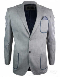 Blazer masculino sob medida, cinza com detalhes em azul, bolsos e cotoveleiras marrons.