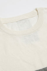 Camiseta masculina de malha com blocos de cores em branco e preto