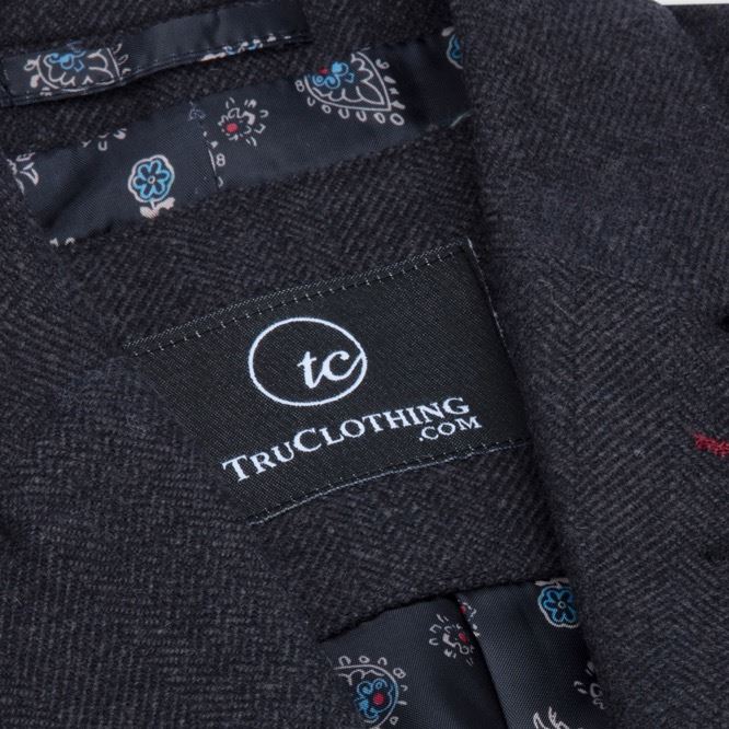 Colete feminino preto em tweed espinha de peixe, lã, clássico, elegante e casual, estilo vintage dos anos 1920.